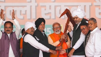 Prime Minister Narendra Modi during a public meeting ahead of the Delhi Assembly election, at RK Puram in New Delhi, Sunday, Feb. 2, 2025. (PTI) Prime Minister Narendra Modi during a public meeting ahead of the Delhi Assembly election, at RK Puram in New Delhi, Sunday, Feb. 2, 2025. (PTI)