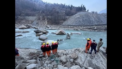Rescue personnel at the mishap site near the Shongtong Bridge in Himachal’s Kinnaur district on Sunday. (HT photo)