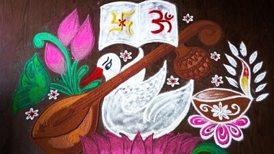 3. Om and Swastik Rangoli - Spiritual symbols like "Om" and "Swastik" bring prosperity and positivity. Design these sacred motifs with traditional rangoli powders in red, yellow and white and accentuate them with marigold petals. (Image by Amutha Manohar) 3. Om and Swastik Rangoli - Spiritual symbols like "Om" and "Swastik" bring prosperity and positivity. Design these sacred motifs with traditional rangoli powders in red, yellow and white and accentuate them with marigold petals. (Image by Amutha Manohar)