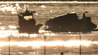 Part of the wreckage is seen as rescue crews search the waters of the Potomac River after a passenger plane on approach to Reagan National Airport crashed into the river after colliding with a US Army helicopter. (AFP) Part of the wreckage is seen as rescue crews search the waters of the Potomac River after a passenger plane on approach to Reagan National Airport crashed into the river after colliding with a US Army helicopter. (AFP)