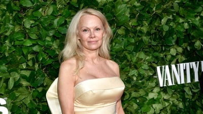 Pamela Anderson revealed she was paid $500 a day to attend Trump's birthday party as a playmate. (Evan Agostini/Invision/AP) Pamela Anderson revealed she was paid $500 a day to attend Trump's birthday party as a playmate. (Evan Agostini/Invision/AP)