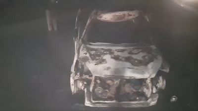 The charred remains of the car. (HT Photo) The charred remains of the car. (HT Photo)