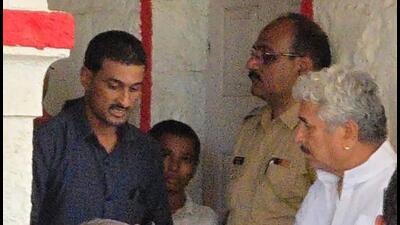 The slain sapranch’s brother Dhananjay Deshmukh (in blue shirt) and daughter Vaibhavi Deshmukh met Namdev Shastri (in white kurta) in Bhagwangad on Sunday afternoon. The slain sapranch’s brother Dhananjay Deshmukh (in blue shirt) and daughter Vaibhavi Deshmukh met Namdev Shastri (in white kurta) in Bhagwangad on Sunday afternoon.