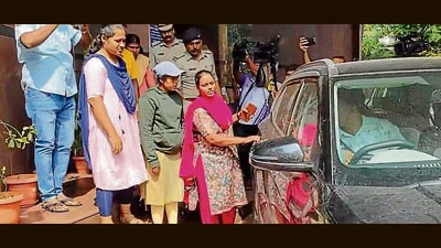 Thombattu Lakshmi, a Maoist, surrendered before the police in Udupi district on Sunday. (PTI) Thombattu Lakshmi, a Maoist, surrendered before the police in Udupi district on Sunday. (PTI)