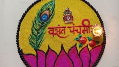 8. Diyas and Kalash Rangoli - A diya (lamp) and kalash (sacred pot) symbolise knowledge and prosperity. Create a rangoli featuring these elements using bright red, orange and gold hues, surrounding them with flower petals. (Image by jaishri Madavi) 8. Diyas and Kalash Rangoli - A diya (lamp) and kalash (sacred pot) symbolise knowledge and prosperity. Create a rangoli featuring these elements using bright red, orange and gold hues, surrounding them with flower petals. (Image by jaishri Madavi)
