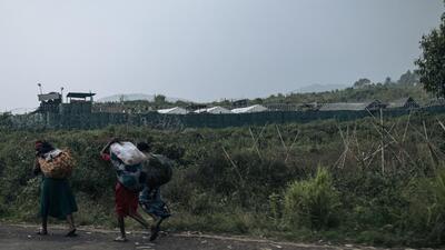 Women walk past a military position of the United Nations Organization Stabilization Mission in the Democratic Republic of the Congo (MONUSCO) in the outskirts of Goma on February 2. (AFP) Women walk past a military position of the United Nations Organization Stabilization Mission in the Democratic Republic of the Congo (MONUSCO) in the outskirts of Goma on February 2. (AFP)