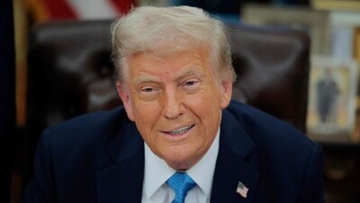 US President Donald Trump talks to reporters after signing an executive order, (Getty Images via AFP)