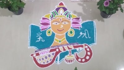 2. Saraswati Portrait Rangoli - For a more artistic approach, craft a detailed rangoli featuring Saraswati seated on a lotus, holding a Veena. Use bright colours like yellow, orange and blue to bring the divine image to life. (Imagr by X/Shimonee_Shah) 2. Saraswati Portrait Rangoli - For a more artistic approach, craft a detailed rangoli featuring Saraswati seated on a lotus, holding a Veena. Use bright colours like yellow, orange and blue to bring the divine image to life. (Imagr by X/Shimonee_Shah)