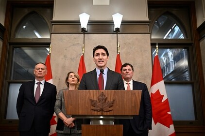 Canada's Prime Minister Justin Trudeau addresses media following the imposition of a raft of tariffs by US President Donald Trump against Canada, Mexico and China in Ottawa on Feb. 1, 2025. (AP) Canada's Prime Minister Justin Trudeau addresses media following the imposition of a raft of tariffs by US President Donald Trump against Canada, Mexico and China in Ottawa on Feb. 1, 2025. (AP)