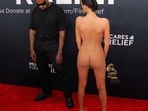Kanye West and Bianca Censori pose at the red carpet.