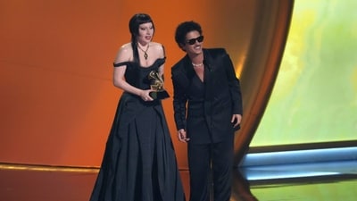 Lady Gaga, left, and Bruno Mars accept the award for best pop duo/group performance for "Die With A Smile" during the 67th annual Grammy Awards on Sunday, Feb. 2, 2025, in Los Angeles. (AP Photo/Chris Pizzello) (Chris Pizzello/Invision/AP)