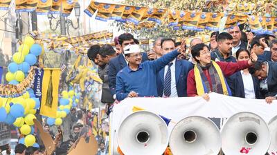 AAP chief Arvind Kejriwal and Delhi chief minister Atishi hold a roadshow in Kalkaji on Monday. (Ajay Aggarwal/HT Photo) AAP chief Arvind Kejriwal and Delhi chief minister Atishi hold a roadshow in Kalkaji on Monday. (Ajay Aggarwal/HT Photo)