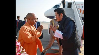 Chief minister Yogi Adityanath welcomes King of Bhutan Jigme Khesar Namgyel Wangchuck at Lucknow airport on Monday. (Sourced)