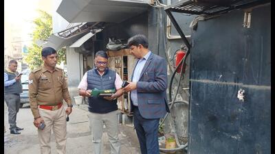 Despite multiple notices and penalties, the service centre continued illegal operations. In June 2024, environmental compensation of ₹12,75,000 was imposed, and power supply was disconnected, officials said. (HT Photo) Despite multiple notices and penalties, the service centre continued illegal operations. In June 2024, environmental compensation of ₹12,75,000 was imposed, and power supply was disconnected, officials said. (HT Photo)