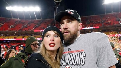 Taylor Swift celebrates with Travis Kelce #87 of the Kansas City Chiefs after defeating the Buffalo Bills 32-29 in the AFC Championship Game at GEHA Field at Arrowhead Stadium on January 26, 2025 in Kansas City. (Getty Images via AFP)
