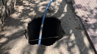 The concerned resident posted images showing the sizable hole in the footpath. (X/@WF_Watcher) The concerned resident posted images showing the sizable hole in the footpath. (X/@WF_Watcher)