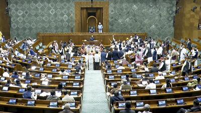Opposition MPs stage a protest in the Lok Sabha during the Budget session of Parliament on Monday. (Sansad TV) Opposition MPs stage a protest in the Lok Sabha during the Budget session of Parliament on Monday. (Sansad TV)