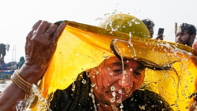 A devotee takes a holy dip on the occasion of 'Basant Panchami' during the ongoing Maha Kumbh Mela, in Prayagraj (PTI/Gurinder Osan) A devotee takes a holy dip on the occasion of 'Basant Panchami' during the ongoing Maha Kumbh Mela, in Prayagraj (PTI/Gurinder Osan)