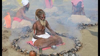 Sadhus performing Dhuni Puja at their camps near Khak Chowk of tent city in Mahakumbh-2025 on Monday. (Anil Kumar Maurya/ HT Photo) Sadhus performing Dhuni Puja at their camps near Khak Chowk of tent city in Mahakumbh-2025 on Monday. (Anil Kumar Maurya/ HT Photo)
