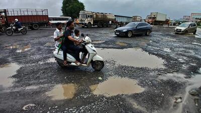 Thane, India - July 14, 2024: Due to rain, there are potholes on National Highway (Mumbai-Nashik By Pass Road ) near Anjur Dive village bhiwandi , in Thane,in Mumbai, India, on, Sunday, July 14, 2024. ( Praful Gangurde / HT Photo ) Thane, India - July 14, 2024: Due to rain, there are potholes on National Highway (Mumbai-Nashik By Pass Road ) near Anjur Dive village bhiwandi , in Thane,in Mumbai, India, on, Sunday, July 14, 2024. ( Praful Gangurde / HT Photo )
