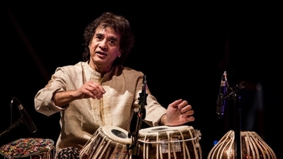 Ustad Zakir Hussain's exclusion from Grammys' In Memoriam section sparks outrage. Ustad Zakir Hussain's exclusion from Grammys' In Memoriam section sparks outrage.