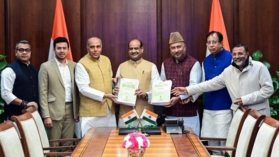 Chairman of JPC on Waqf (Amendment) Bill, 2024, BJP MP Jagdambika Pal submits the final report on Waqf (Amendment) Bill to Lok Sabha Speaker Om Birla, at Parliament in New Delhi on Thursday. (ANI)