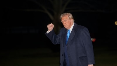 President Donald Trump walks from Marine One upon arrival on the South Lawn of the White House in Washington, Sunday, Feb. 2, 2025. (AP) President Donald Trump walks from Marine One upon arrival on the South Lawn of the White House in Washington, Sunday, Feb. 2, 2025. (AP)