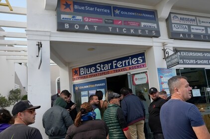 People wait to buy boat and air tickets as Greek authorities are taking emergency measures in response to intense seismic activity on the popular Aegean Sea holiday island of Santorini, southern Greece, Monday, Feb. 3, 2025. (AP Photo/Petros Giannakouris) (AP) People wait to buy boat and air tickets as Greek authorities are taking emergency measures in response to intense seismic activity on the popular Aegean Sea holiday island of Santorini, southern Greece, Monday, Feb. 3, 2025. (AP Photo/Petros Giannakouris) (AP)