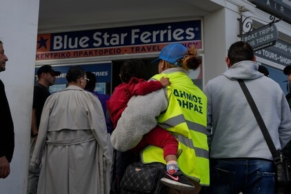 People wait to buy boat and air tickets as Greek authorities are taking emergency measures in response to intense seismic activity on the popular Aegean Sea holiday island of Santorini, southern Greece, Monday, Feb. 3, 2025. (AP) People wait to buy boat and air tickets as Greek authorities are taking emergency measures in response to intense seismic activity on the popular Aegean Sea holiday island of Santorini, southern Greece, Monday, Feb. 3, 2025. (AP)