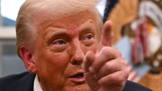 US President Donald Trump points while speaking to journalists about TikTok as he signs executive orders in the Oval Office of the White House in Washington, DC. (File) (AFP)