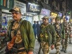 Police personnel patrol Jama Masjid area on the eve of the Delhi assembly elections, in New Delhi, on Tuesday. (PTI) Police personnel patrol Jama Masjid area on the eve of the Delhi assembly elections, in New Delhi, on Tuesday. (PTI)