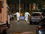 Police technicians enter the Risbergska school following a deadly shooting attack at the adult education center Campus Risbergska school in Orebro, Sweden,