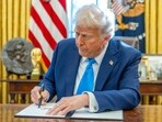 US President Donald Trump signs an executive order in the Oval Office of the White House in Washington, DC, US, on Tuesday, Feb. 4, 2025. Trump signed two executive orders, one to reimpose pressure on Iran, as well as withdraw the US from the United Nations Relief and Workers Agency (UNRWA) and the United Nations Human Rights Council. Photographer: Shawn Thew/EPA/Bloomberg US President Donald Trump signs an executive order in the Oval Office of the White House in Washington, DC, US, on Tuesday, Feb. 4, 2025. Trump signed two executive orders, one to reimpose pressure on Iran, as well as withdraw the US from the United Nations Relief and Workers Agency (UNRWA) and the United Nations Human Rights Council. Photographer: Shawn Thew/EPA/Bloomberg