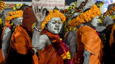 Along with the male Naga sadhus, a significant number of female sanyasis were also present on the occasion, often wearing loose orange robes and garlands (Ishant) Along with the male Naga sadhus, a significant number of female sanyasis were also present on the occasion, often wearing loose orange robes and garlands (Ishant)