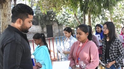 The documents of the candidates were checked before they entered the exam hall. (Santosh Kumar) The documents of the candidates were checked before they entered the exam hall. (Santosh Kumar)