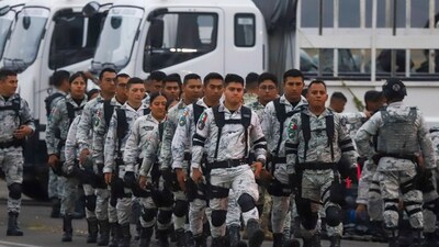 Mexican National Guards prepare to board an aircraft at the International Airport in Merida, Mexico, Tuesday, Feb. 4, 2025, to travel north to reinforce the country's border with the United States. (AP Photo/Martin Zetina) (AP) Mexican National Guards prepare to board an aircraft at the International Airport in Merida, Mexico, Tuesday, Feb. 4, 2025, to travel north to reinforce the country's border with the United States. (AP Photo/Martin Zetina) (AP)