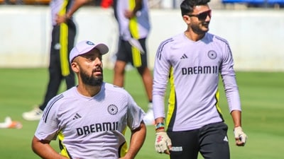 India's Varun Chakravarthy and Axar Patel during a training session ahead of the first ODI cricket match against England, at Vidarbha Cricket Association Stadium in Nagpur (PTI) India's Varun Chakravarthy and Axar Patel during a training session ahead of the first ODI cricket match against England, at Vidarbha Cricket Association Stadium in Nagpur (PTI)