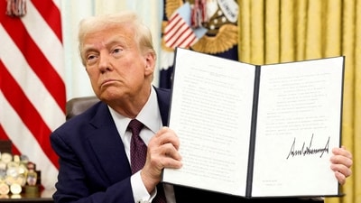 US President Donald Trump holds a signed executive order on AI, in the Oval Office of the White House, in Washington. (File image) (REUTERS)