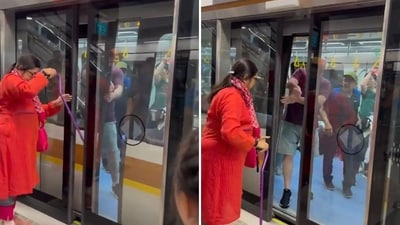 A woman was filmed trying to board Singapore MRT while the doors were closing A woman was filmed trying to board Singapore MRT while the doors were closing