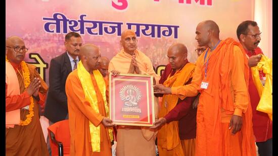 CM Yogi Adityanath at ‘Buddhist Mahakumbh Yatra’ in Prayagraj on Tuesday. (HT Photo)