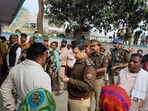 Voters queue outside a polling booth in Ayodhya's Milkipur to cast their votes in the assembly bypoll on Tuesday. Voters queue outside a polling booth in Ayodhya's Milkipur to cast their votes in the assembly bypoll on Tuesday.
