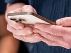 Tim Cook, CEO of Apple with the iPhone 16 Pro in Desert Titanium. Tim Cook, CEO of Apple with the iPhone 16 Pro in Desert Titanium.