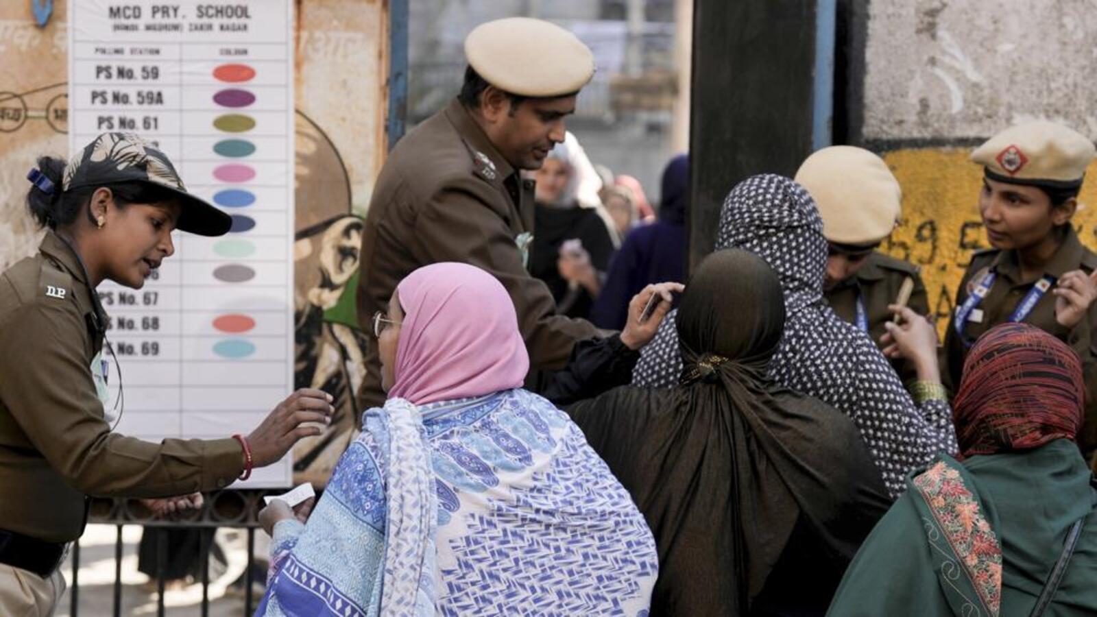 Exit polls give edge to BJP in tight Delhi race | Latest News India Exit polls give edge to BJP in tight Delhi race | Latest News India