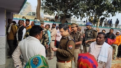 Voters queue outside a polling booth in Ayodhya's Milkipur to cast their votes in the assembly bypoll on Tuesday. (HT Photo) Voters queue outside a polling booth in Ayodhya's Milkipur to cast their votes in the assembly bypoll on Tuesday. (HT Photo)