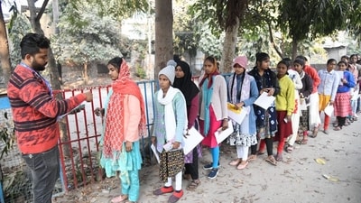 Officials check the details of the candidates waiting to appear for the BSEB Class 12 Exams in Patna (Santosh Kumar) Officials check the details of the candidates waiting to appear for the BSEB Class 12 Exams in Patna (Santosh Kumar)