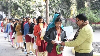 Students show their admit cards to officials to appear for the Day 3 of BSEB Class 12 Board exams in Patna (Santosh Kumar) Students show their admit cards to officials to appear for the Day 3 of BSEB Class 12 Board exams in Patna (Santosh Kumar)