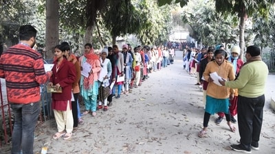 Officials check the admit cards of candidates appearing for BSEB Class 12 board exams in Patna (Santosh Kumar) Officials check the admit cards of candidates appearing for BSEB Class 12 board exams in Patna (Santosh Kumar)