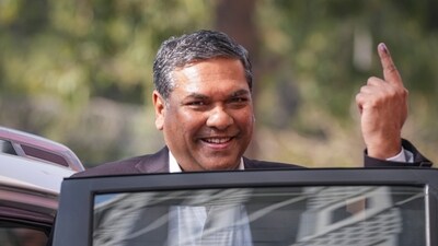 Chief Justice of India Sanjiv Khanna displayed his inked finger after casting his vote at a polling booth in New Delhi during the Assembly elections. (PTI) Chief Justice of India Sanjiv Khanna displayed his inked finger after casting his vote at a polling booth in New Delhi during the Assembly elections. (PTI)