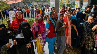 Voters cast their ballots at a polling station set up at MCD Primary School near Zakir Hussain College during the Delhi Assembly election in New Delhi on Wednesday. (HT Photo/ Raj K Raj) Voters cast their ballots at a polling station set up at MCD Primary School near Zakir Hussain College during the Delhi Assembly election in New Delhi on Wednesday. (HT Photo/ Raj K Raj)
