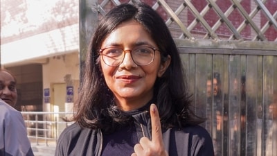 Rajya Sabha MP Swati Maliwal showcased her inked finger after voting in the Delhi Assembly elections in New Delhi. (PTI) Rajya Sabha MP Swati Maliwal showcased her inked finger after voting in the Delhi Assembly elections in New Delhi. (PTI)